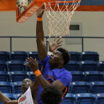 Angelina College’s Quinton Bush (10) battles for a bucket over Cedar Valley’s Eric Stewart (5) and Levin Johnson (15) during Saturday’s game at Shands Gymnasium.  (AC Press photo by DeShun Pham-Adams)