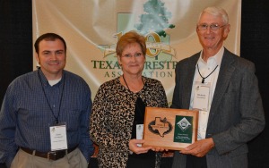 Richard and Pat Saunders accept the award for TFA 2015 Texas Outstanding Tree Farm of the Year.