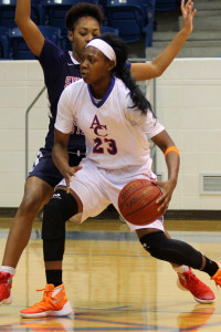 LaNeique Nealey (23) of Angelina College battles for position against Seminole State’s Chelsey Olds during Friday’s game at Shands Gymnasium. Seminole State held off AC’s late rally to drop the Lady Roadrunners to a 71-65 loss in the opening day of the Angelina Classic. (Photo: AC Press)