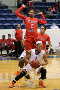 Trinity Valley’s Naomi Davenport (5) forces Angelina College’s Ariel Taylor to change directions during Saturday’s game at Shands Gymnasium. The No. 2-ranked Lady Cardinals held on for a 64-62 win to thwart the Lady ‘Runners upset bid. (AC Press photo by DeShun Pham-Adams)