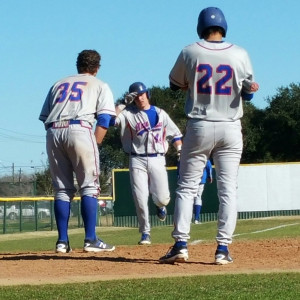 Angelina College’s Mitch Andrews (44) trots to the plate for a greeting from Mitch Henshaw (35) and Chris Estrada (22). Andrews’ homer helped power the Roadrunners to an 18-7, 2-0 sweep of Wharton College Tuesday in Wharton. (Contributed photo by Shanna English)