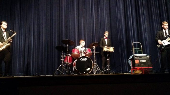 A small jazz ensemble plays during the Spring Concert as different bands set up and tore down equipment.